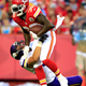 Joe McKnight, No. 30, of the Kansas City Chiefs is tackled by Audie Cole, No. 57, of the Minnesota Vikings at Arrowhead Stadium in Kansas City, Mo., on Aug. 23, 2014.(Jamie Squire/Getty Images)